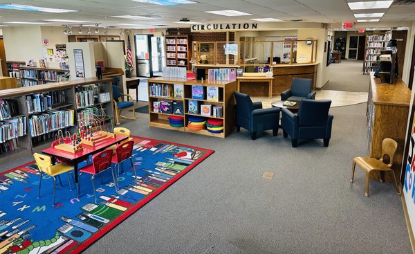Interior view of the library showing the circulation desk. Interior view of the library showing the circulation desk